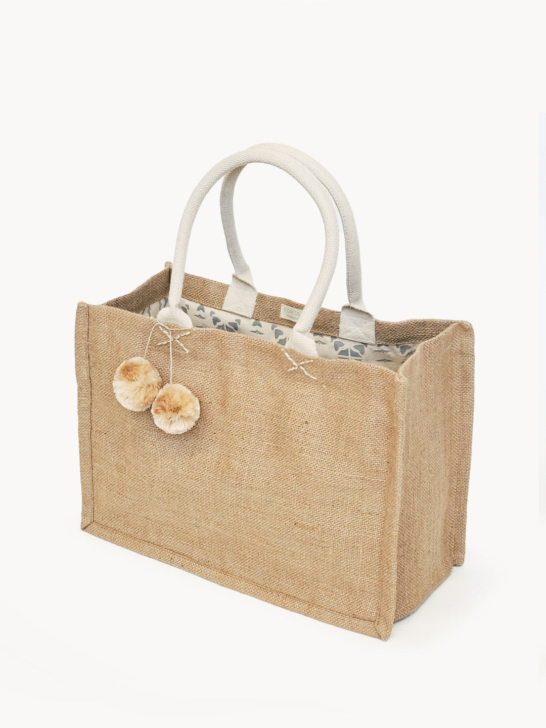 Jute canvas shopping bag with colorful pompom accents and roomy interior