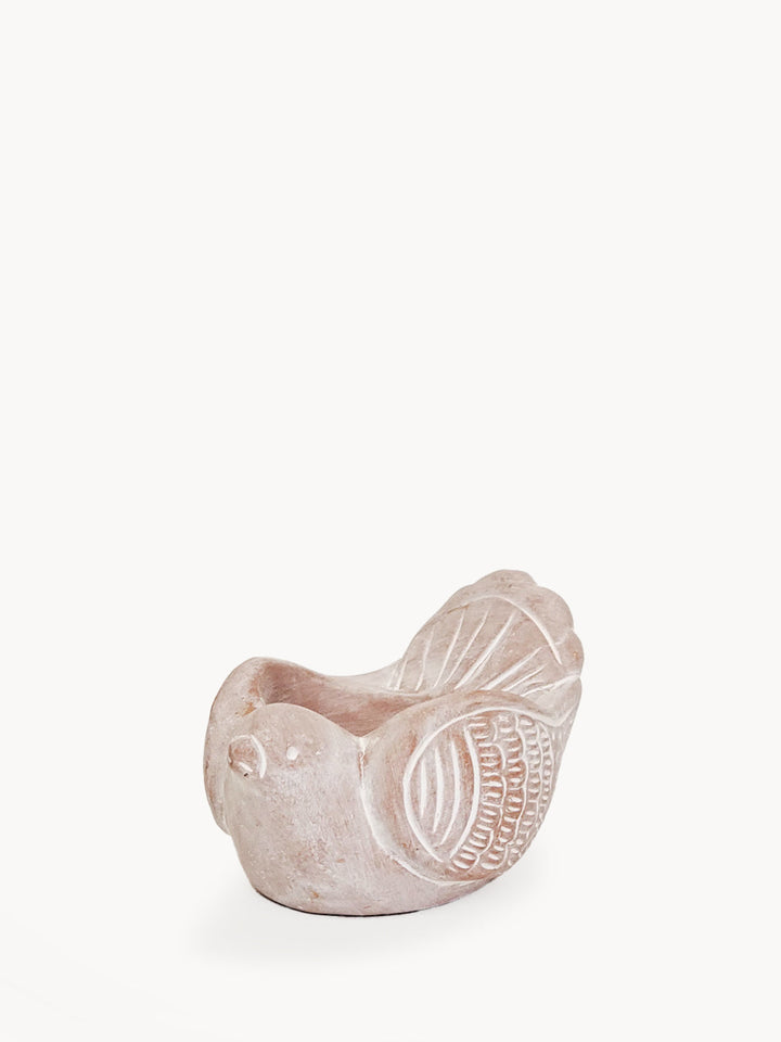 Terracotta bird-shaped tea light holder in a natural clay finish