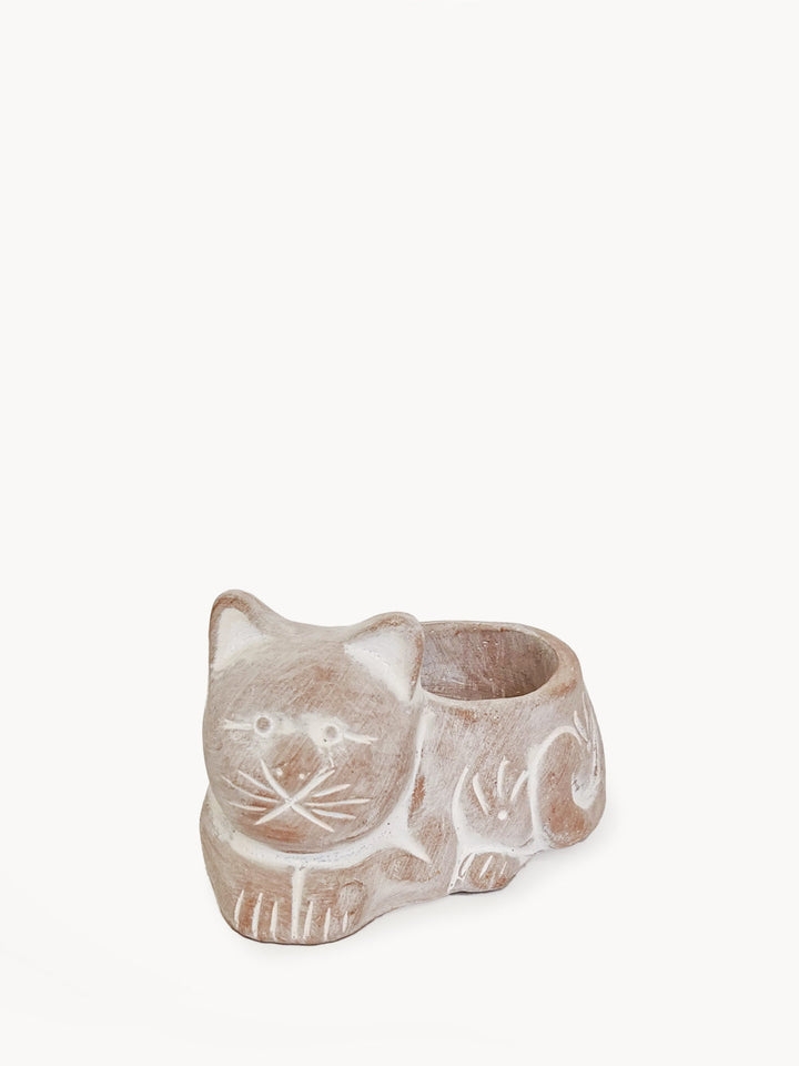 Terracotta sleeping-cat tea light holder in natural clay