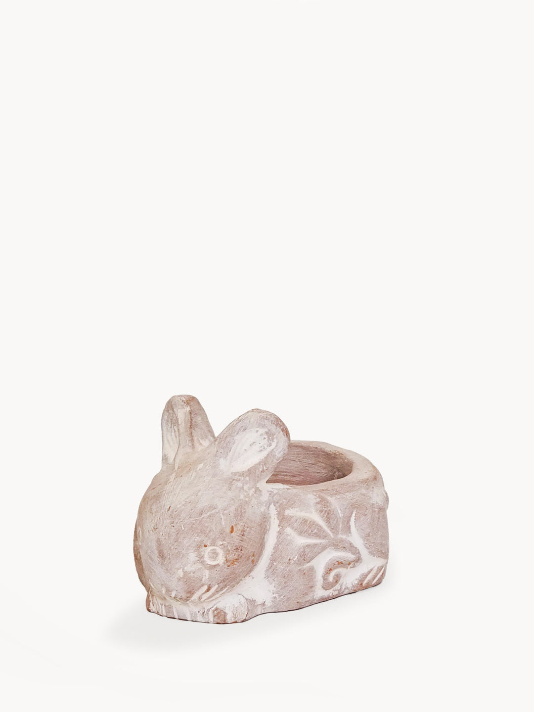 Terracotta rabbit-shaped tea light holder with a hollow interior