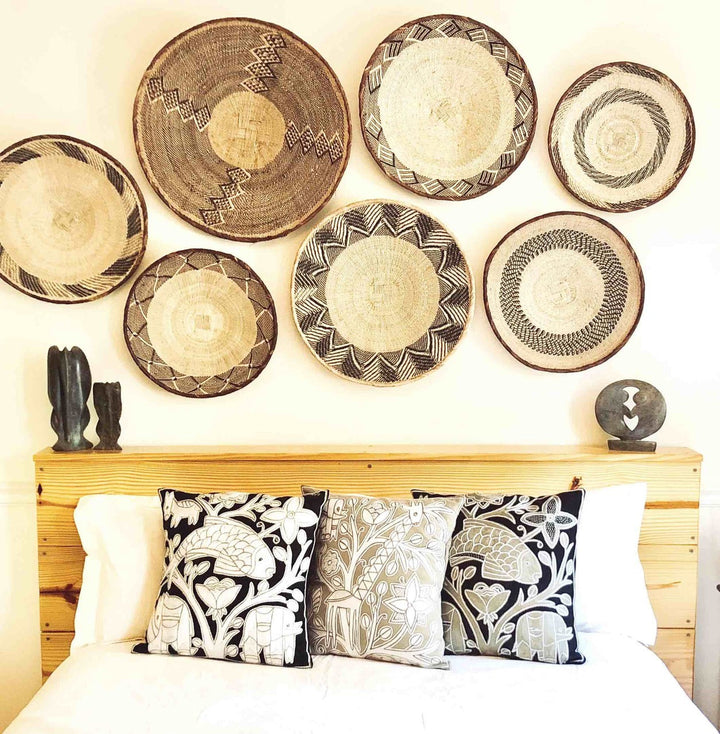 Medium Tonga basket, round handwoven natural fiber with a textured weave.