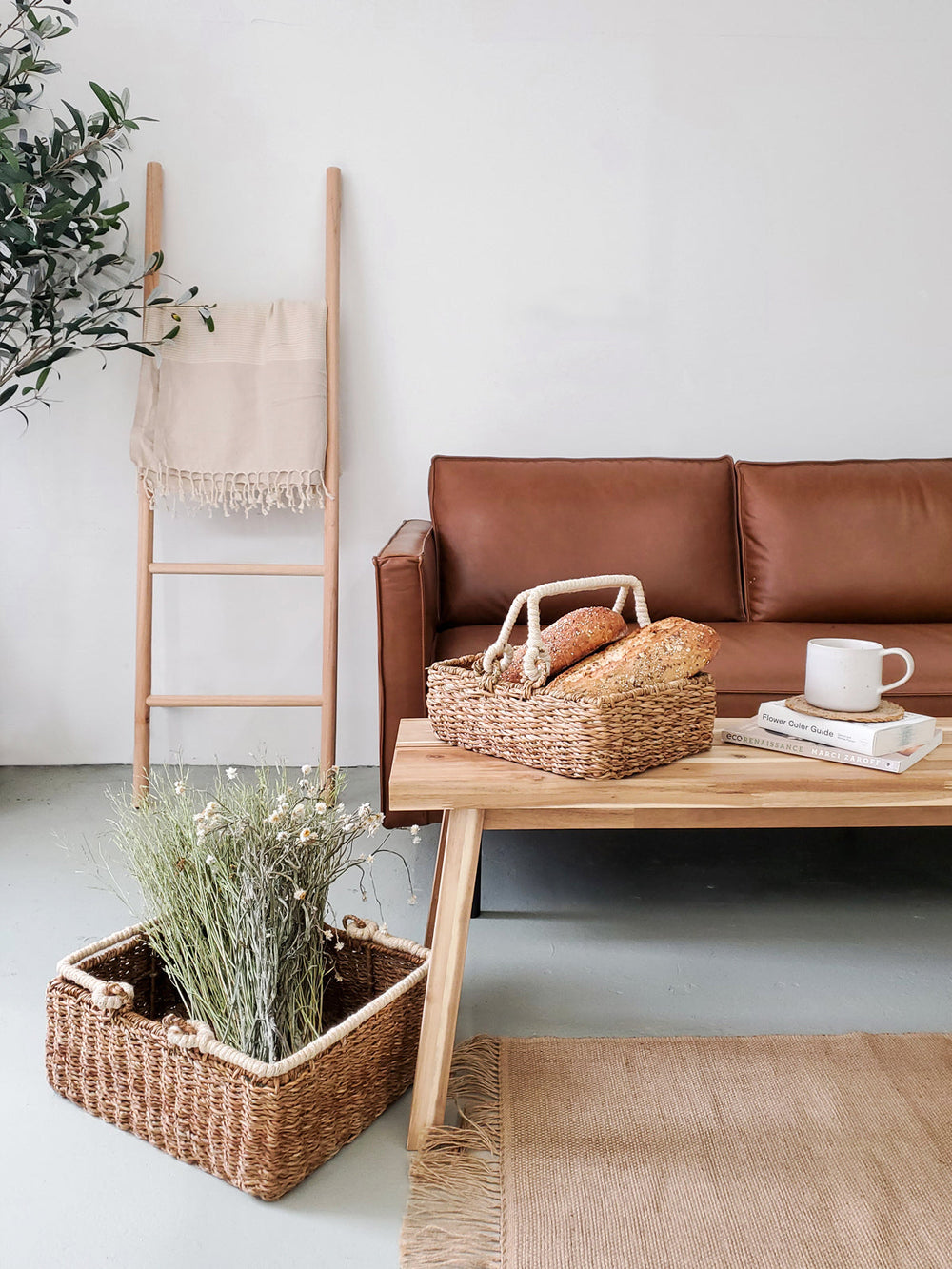 Seagrass storage basket with handle by DC-KORISSA, natural woven basket ideal for organizing home or office spaces.
