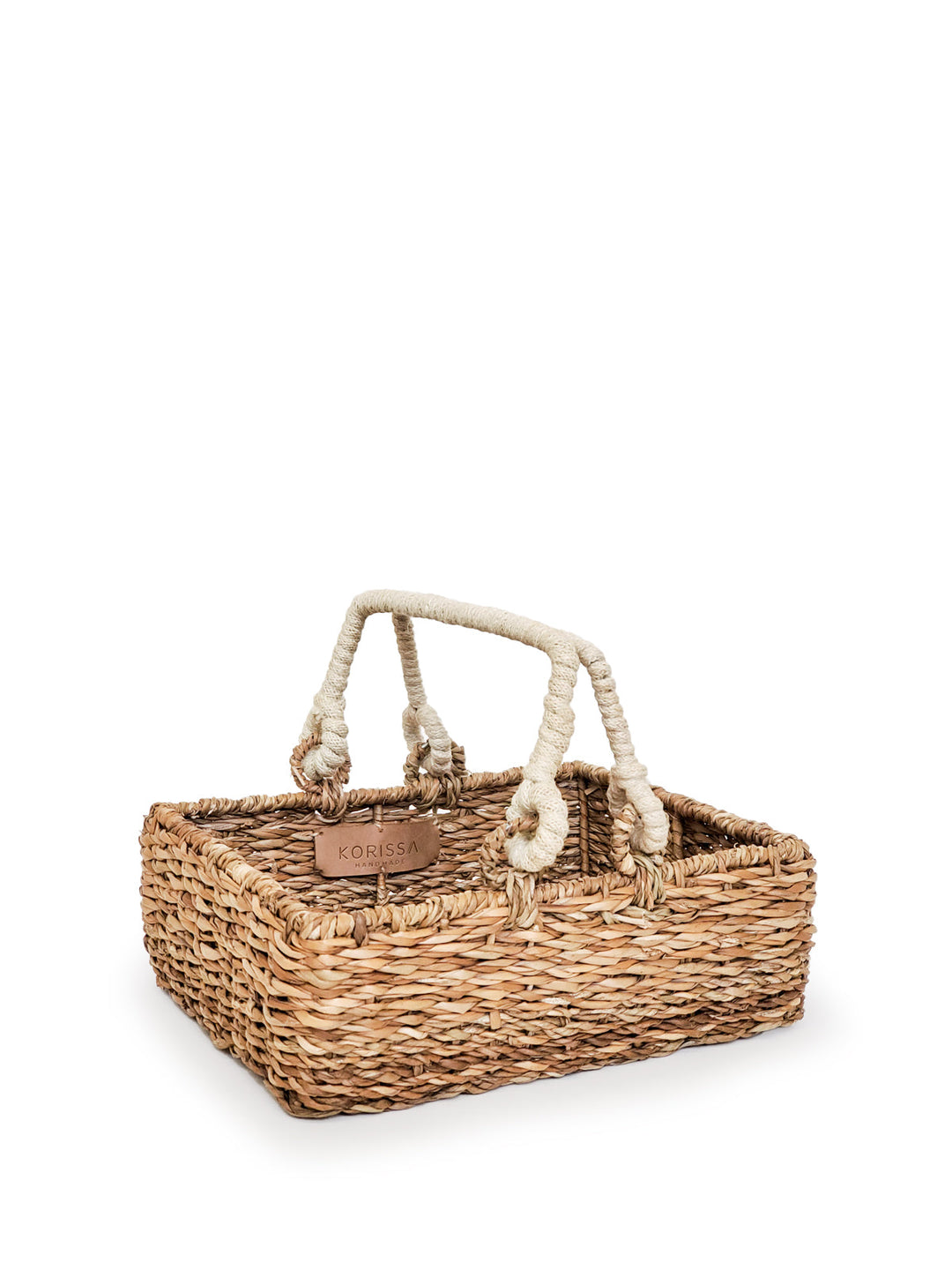 Seagrass tote basket with sturdy jute handles, handwoven for storage and carrying