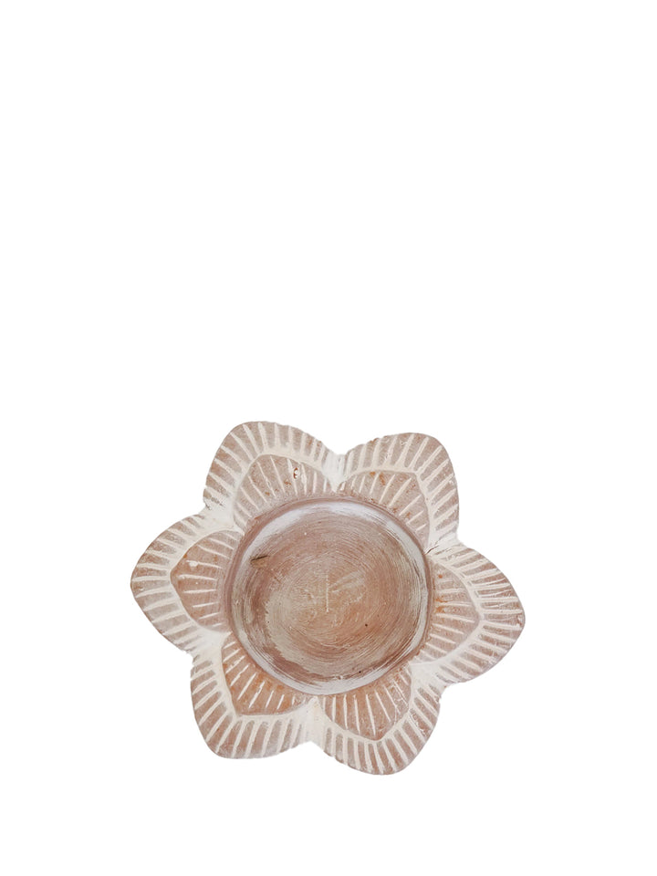 Floral terracotta tea light holder with an intricate flower design