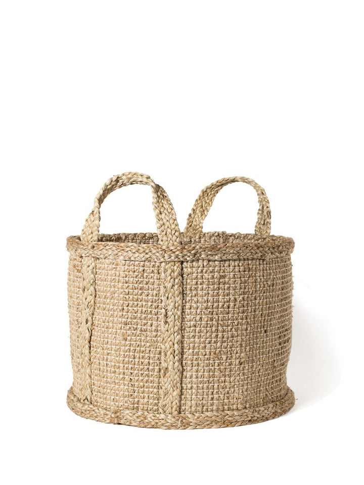 Natural jute basket by DC-KORISSA, showing a woven, eco-friendly storage basket with handles on a neutral background.