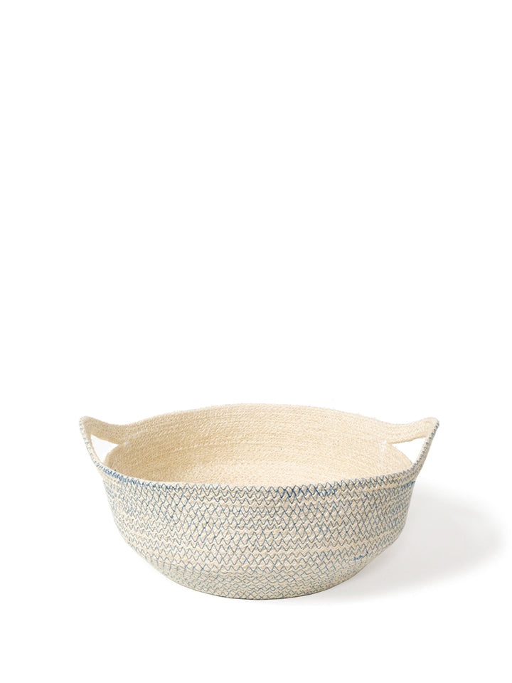 Jute fruit bowl with blue stitch trim and looped handles, ideal for kitchen
