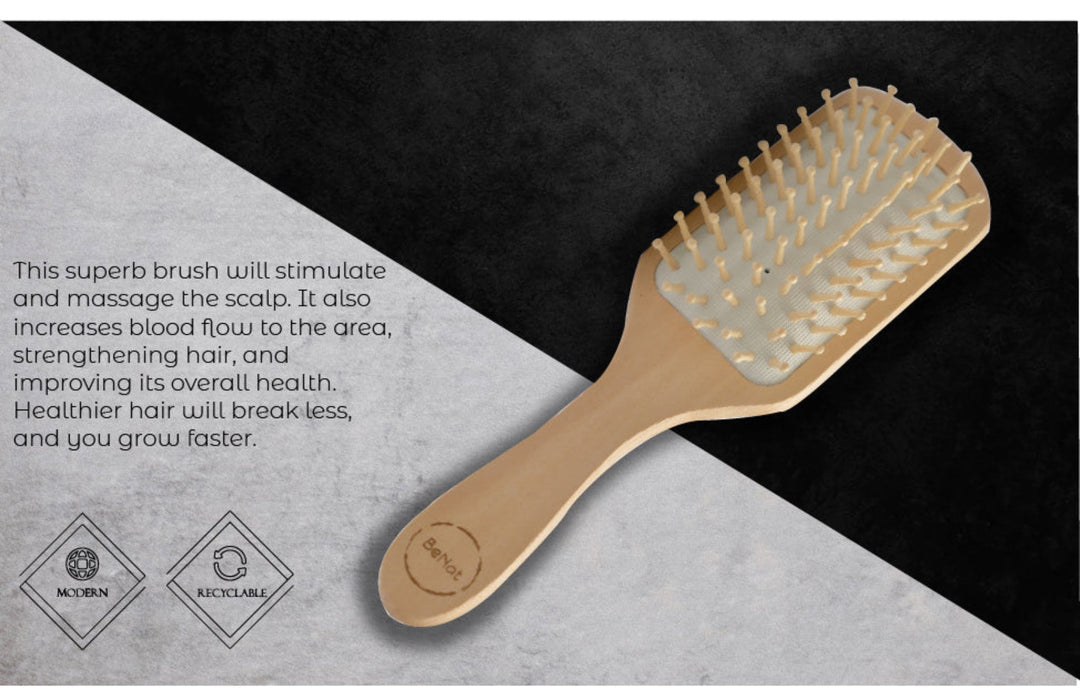Bamboo detangling hair brush with a natural wooden handle and bristles, designed for gentle hair detangling.
