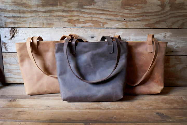 Large full-grain leather tote bag with sturdy handles and a roomy interior.