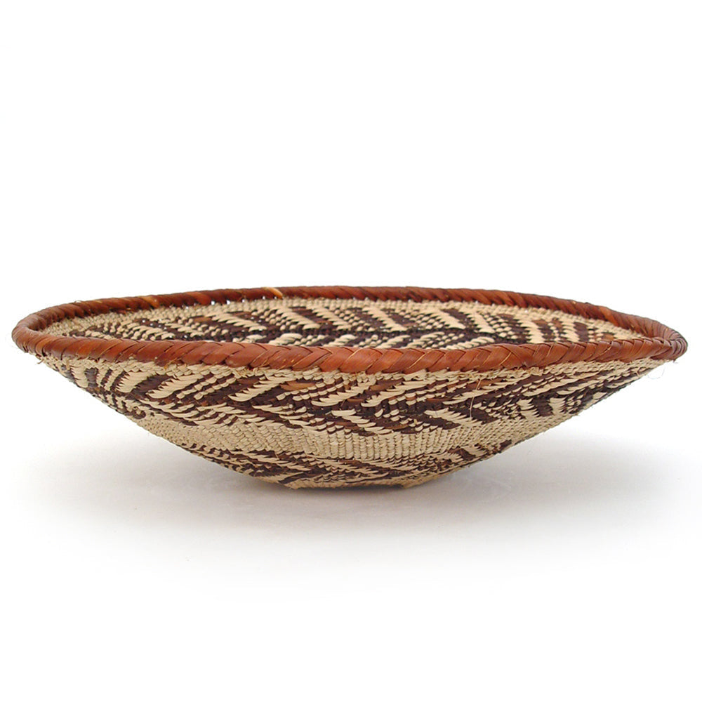 Handwoven small Tonga catch-all basket for storage or decor.