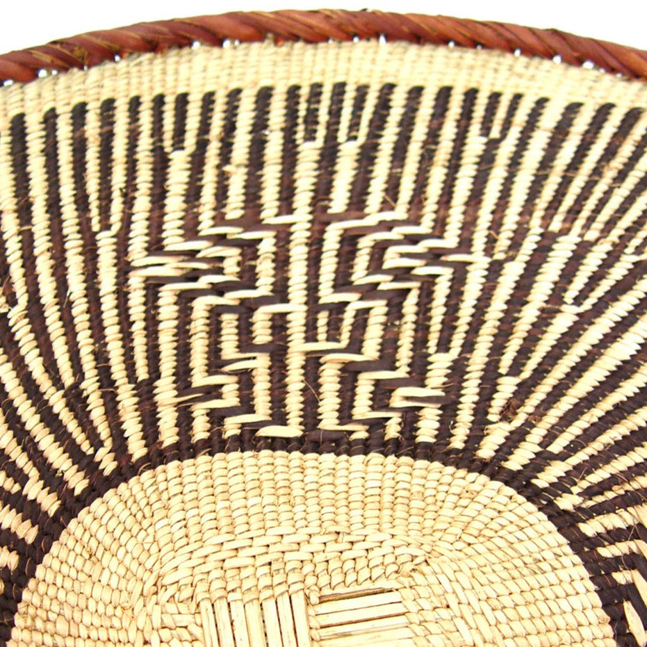 Medium Tonga basket with a textured woven surface.
