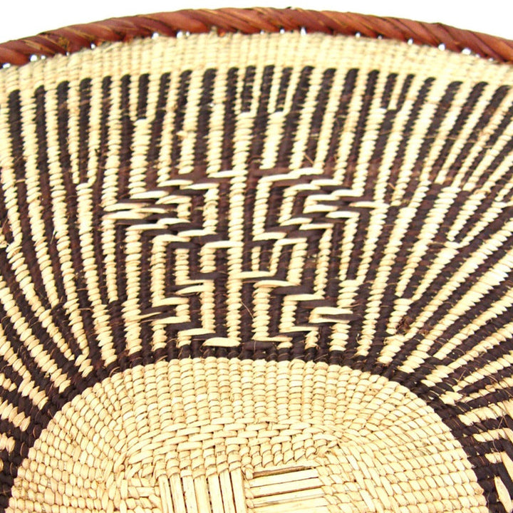 Medium Tonga basket with a textured woven surface.