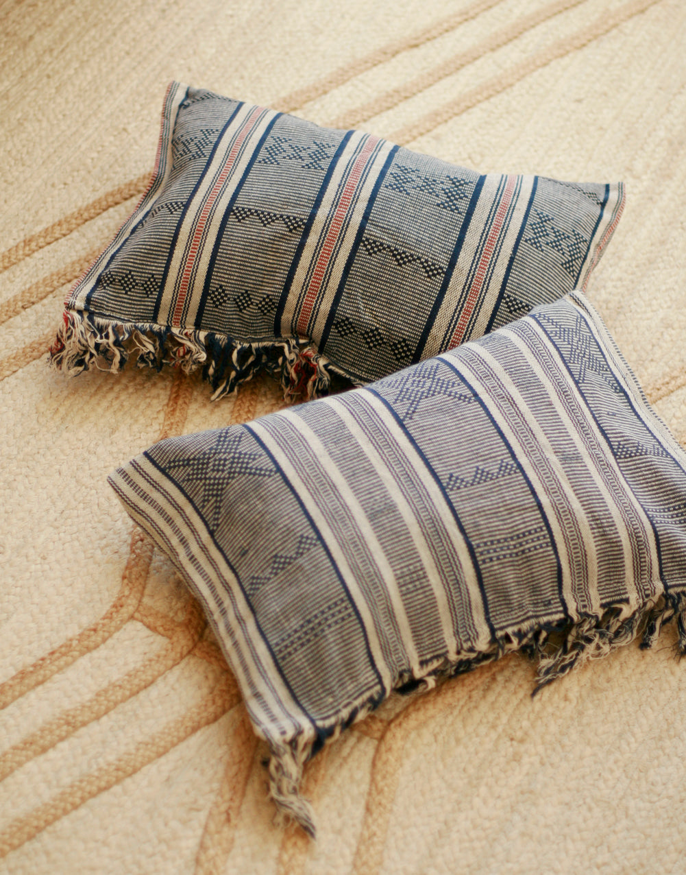 Handwoven Sumba ikat pillow cover featuring vibrant traditional Indonesian patterns and decorative textile design.