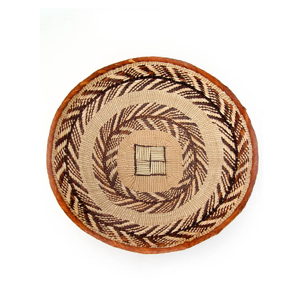 Tonga wall baskets, set of five handwoven natural-fiber baskets for wall decor.
