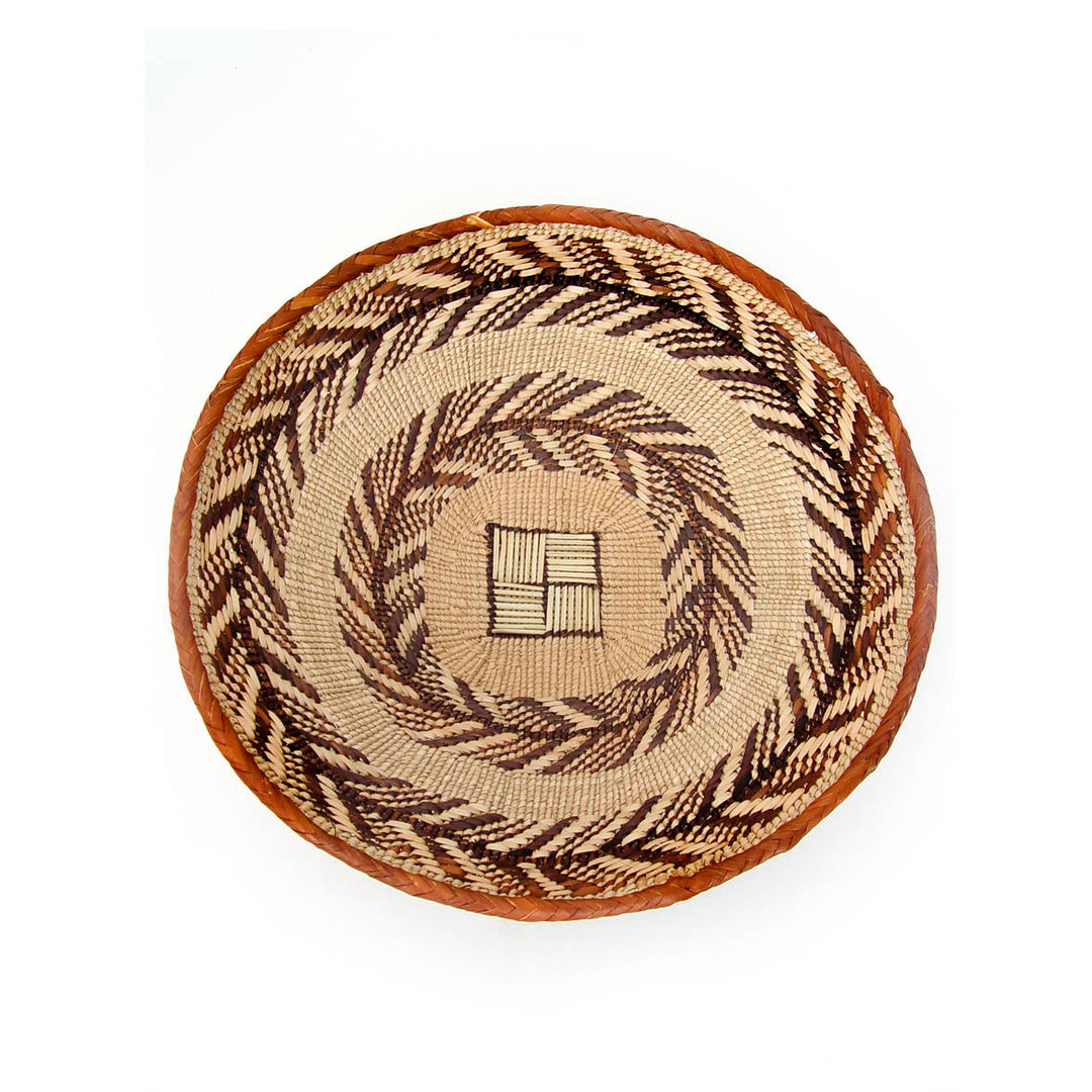 Tonga wall baskets, set of five handwoven natural-fiber baskets for wall decor.