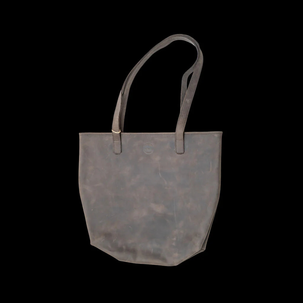 Large full-grain leather tote bag with a roomy interior and long straps.
