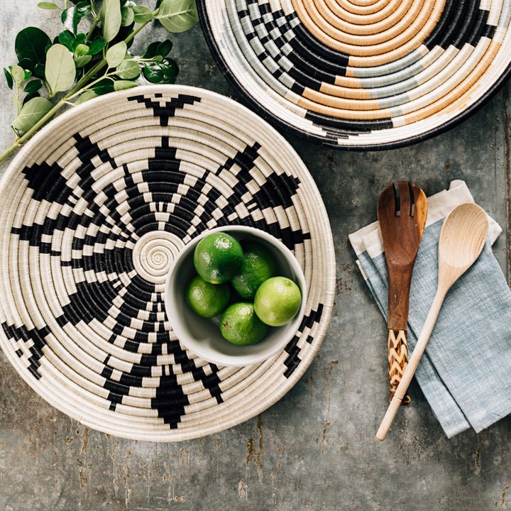 Boutique Cactus Blossom woven bowl laid flat, in cream and black sisal.