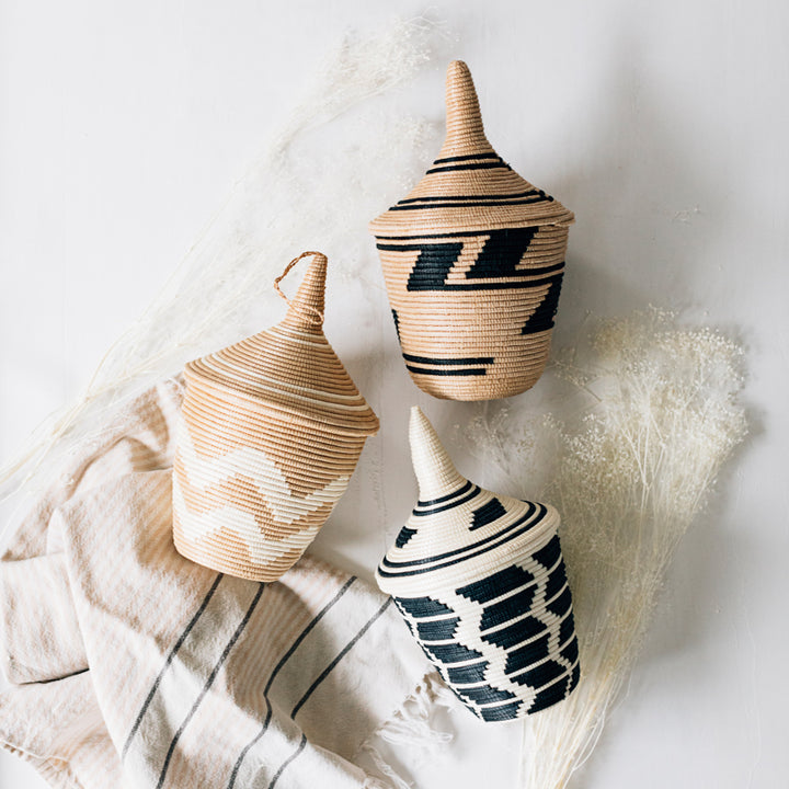 Sisal peace basket with a black and white chevron pattern.