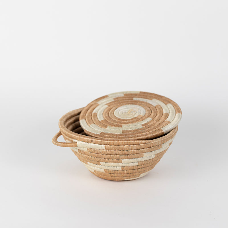 Medium woven storage pot with a tea-dyed lid and a secure fit.