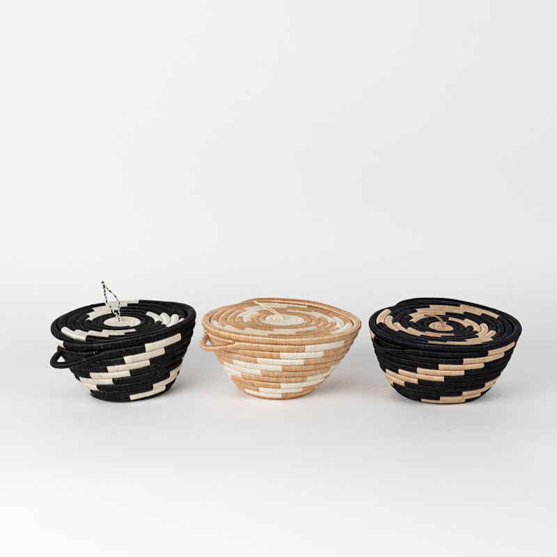 Medium woven storage pot with a tea-dyed lid and a twist-pattern sisal weave.