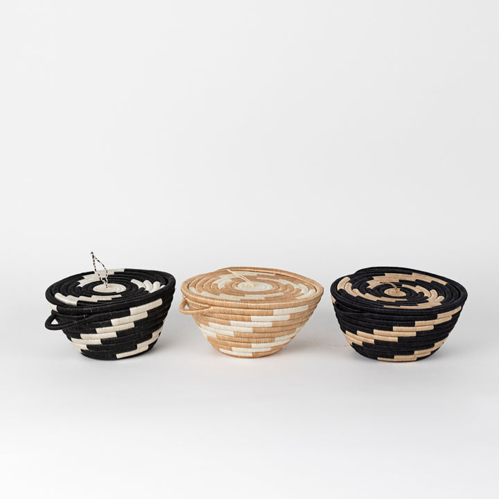 Medium woven storage pot with a tea-dyed lid and a twist-pattern sisal weave.