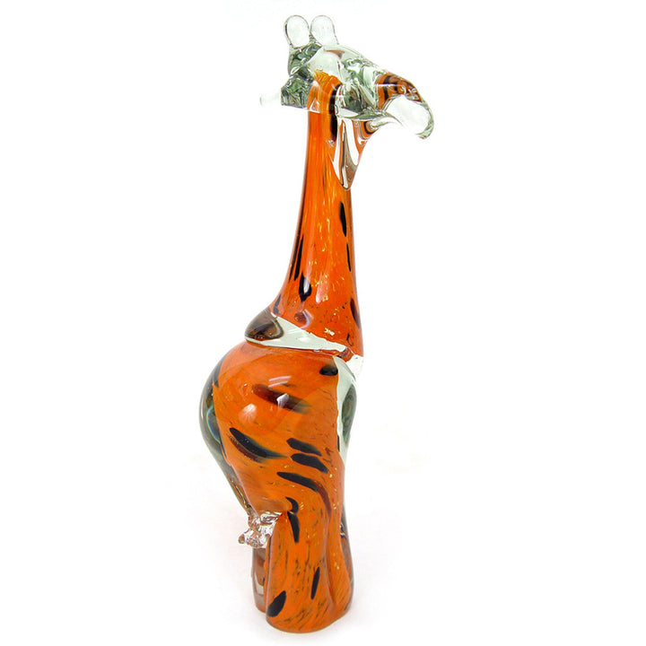 Handblown glass giraffe in orange, showing intricate detailing.
