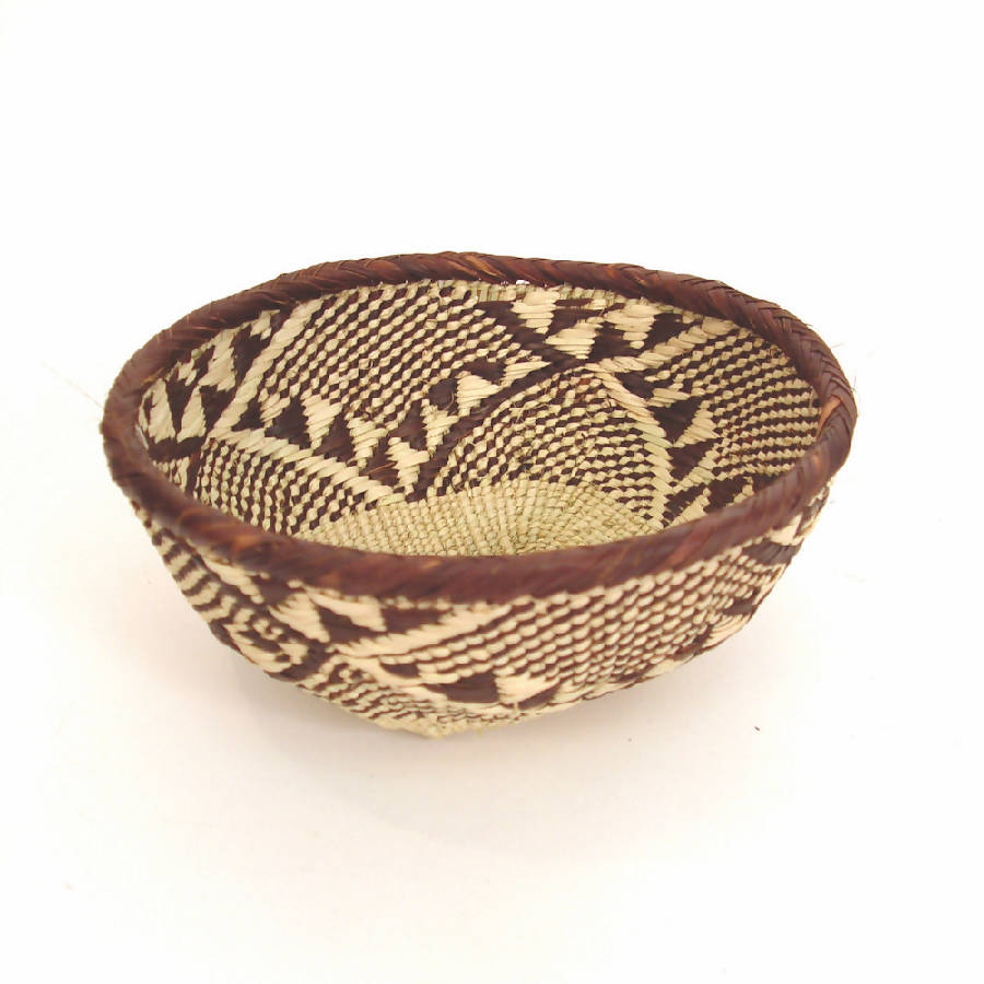 Tonga basket bowls, handwoven natural-fiber bowls with woven patterns.
