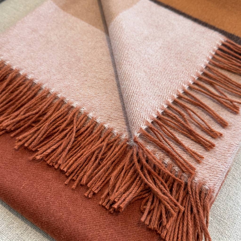 Russet baby alpaca throw, handwoven in Peru from first-shearing fleece.