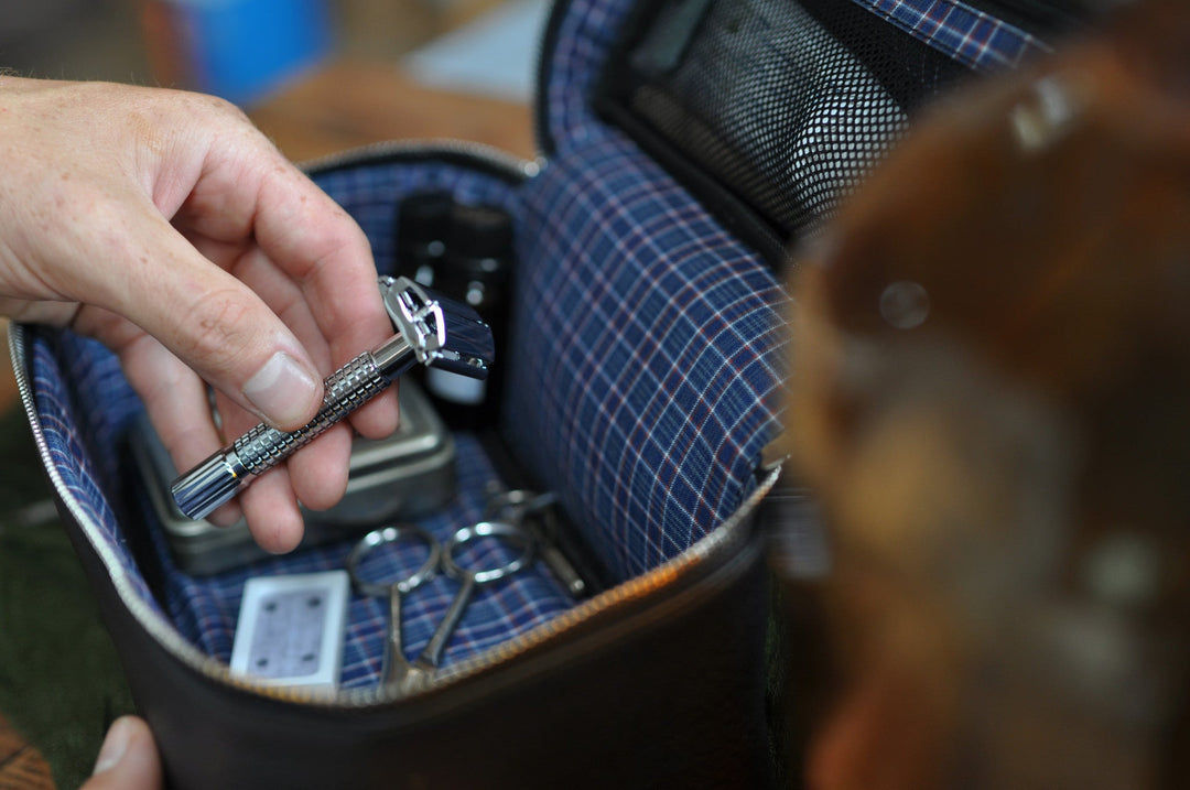 Handcrafted leather dopp kit with a zipper closure and durable stitching.