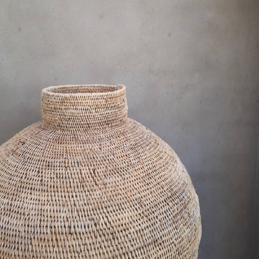 Buhera cane storage baskets with sturdy handles, handwoven natural design from Zimbabwe.