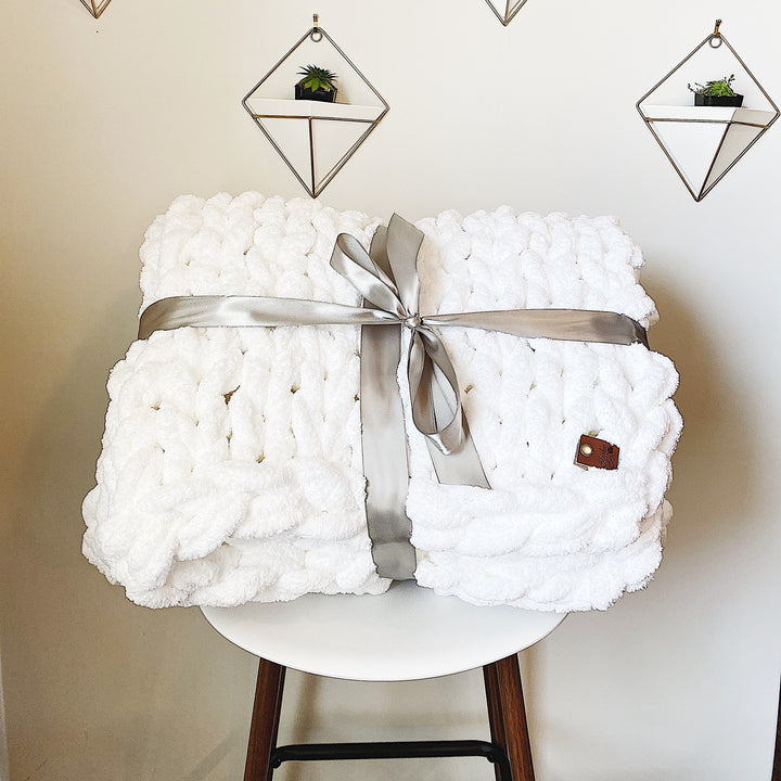 White chunky knit chenille throw blanket, soft oversized hand-knit texture