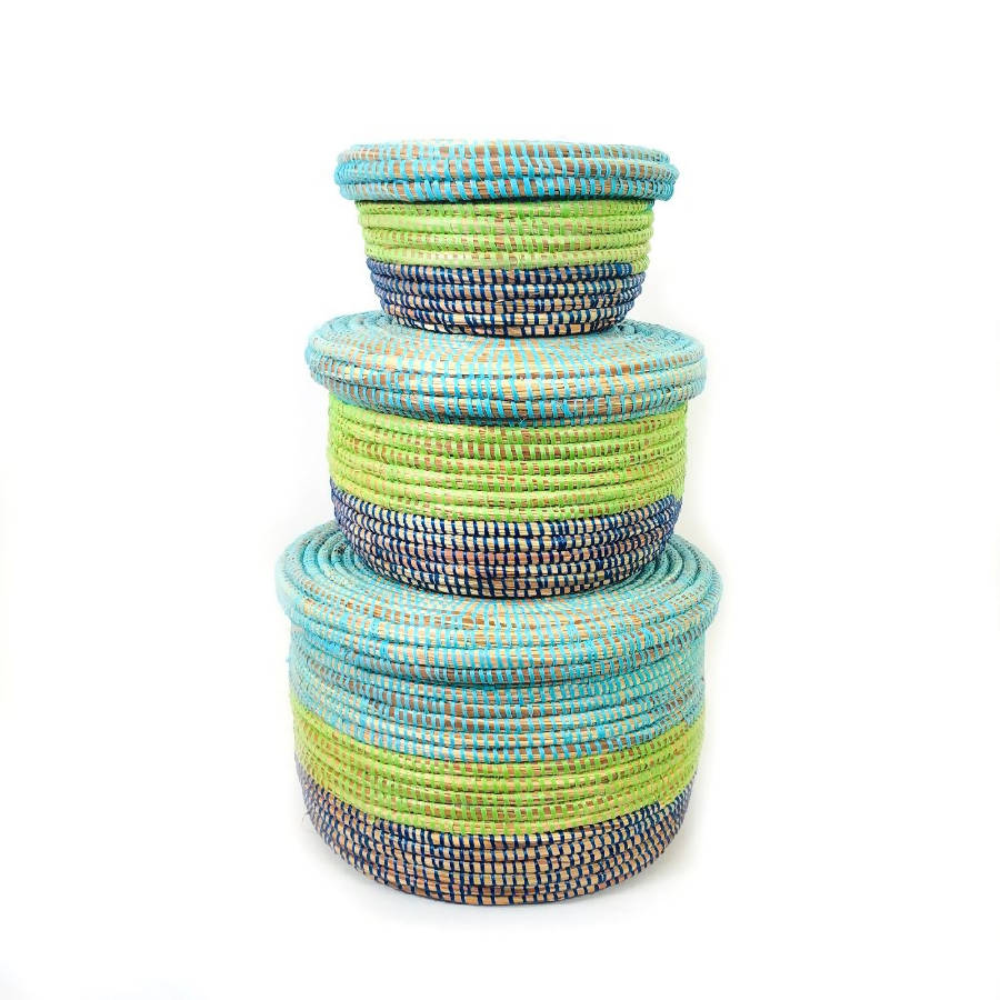 Coastal-blue handwoven storage baskets with sturdy handles and textured weave.