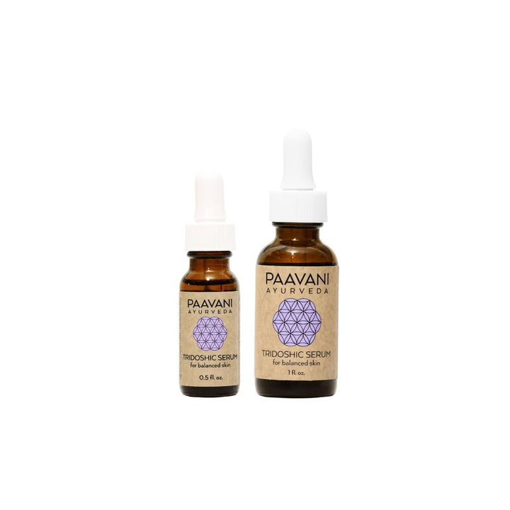 Tridoshic Ayurvedic face serum dropper bottle with natural ingredients.
