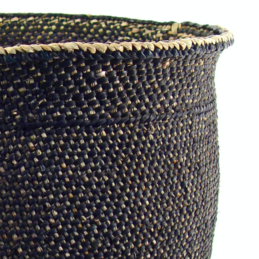 Handwoven black and natural Iringa basket with a geometric pattern