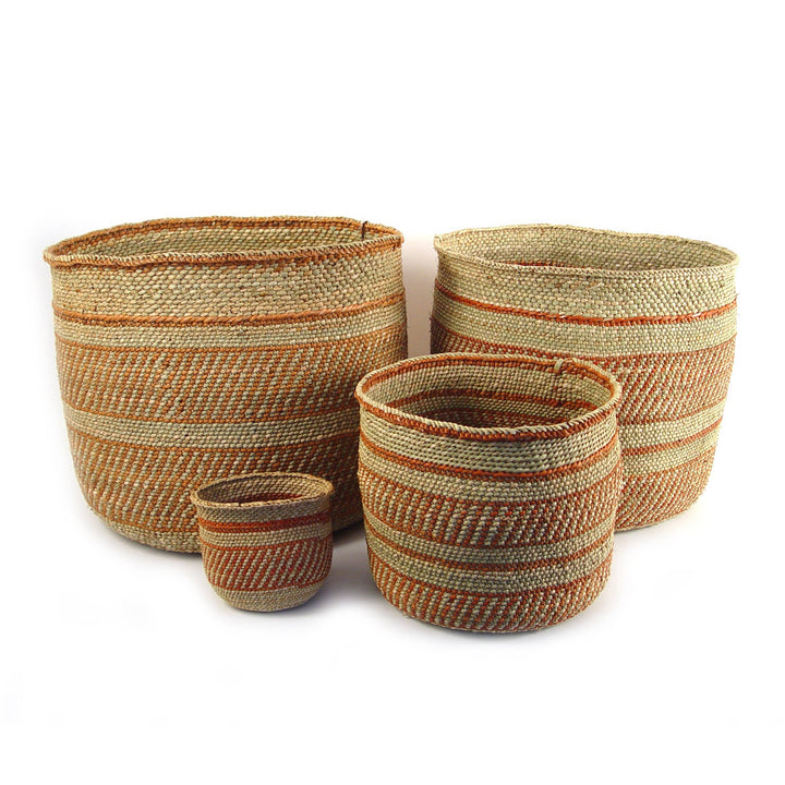 Auburn Stripe Iringa basket handwoven from milulu grass with bands of rust running through pale grass