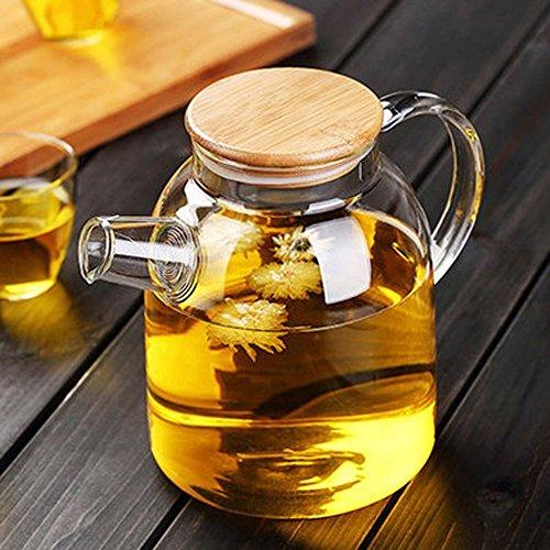 Large 54 oz borosilicate glass teapot with a clear body and lid, for brewing tea.
