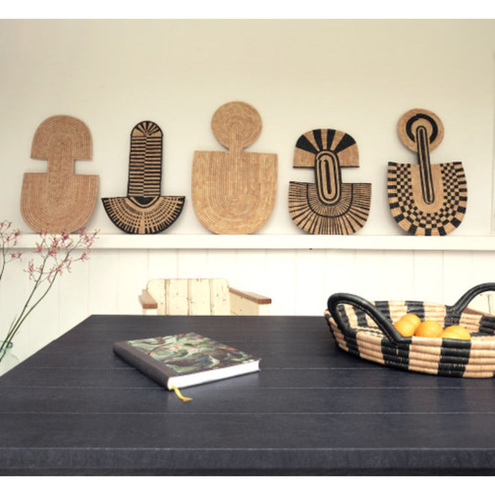 Woven palm leaf abstract wall mask, handcrafted African wall decor from Malawi.