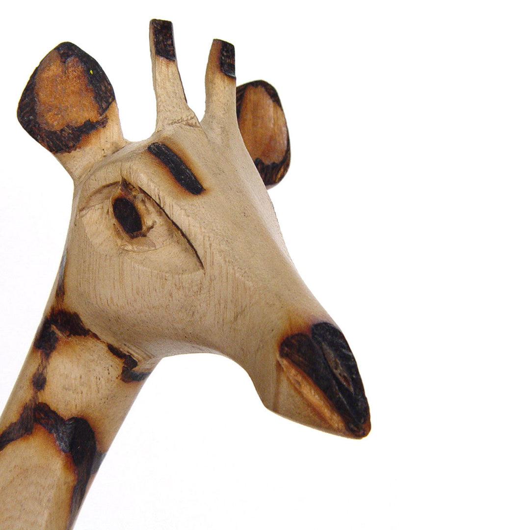 Jacaranda wood giraffe pair, hand-carved wooden figurines on a neutral background.