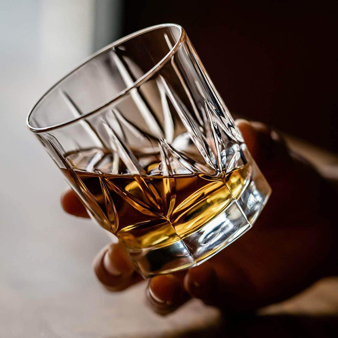Handcrafted crystal whiskey tumblers with smooth glass and an elegant design.