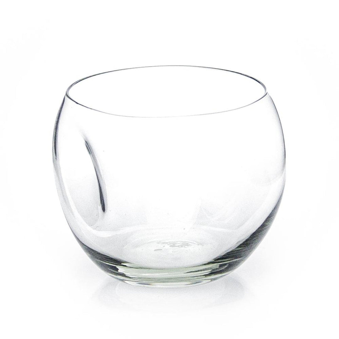 Dented recycled glass whiskey tumbler with sculptural sides, mouth-blown in Eswatini