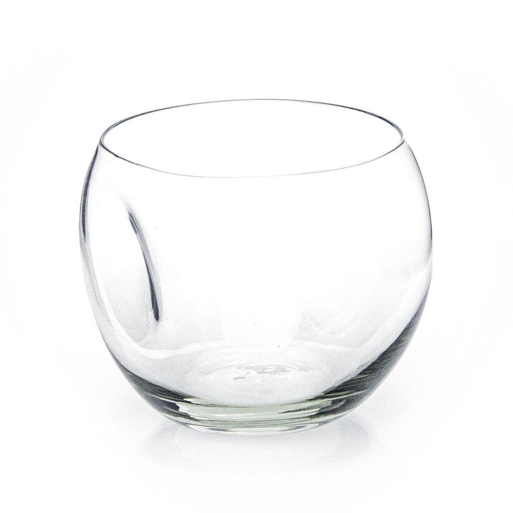 Dented recycled glass whiskey tumbler with sculptural sides, mouth-blown in Eswatini