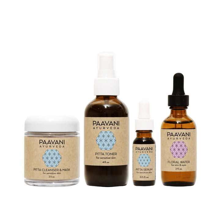 Pitta Ayurvedic skincare ritual with herbs and oils.
