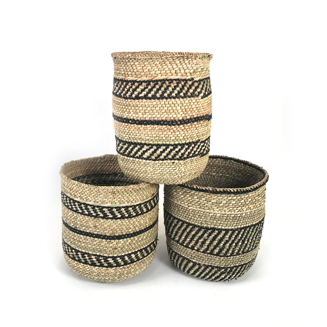 Handwoven black stripe Iringa storage basket with a sturdy woven design.