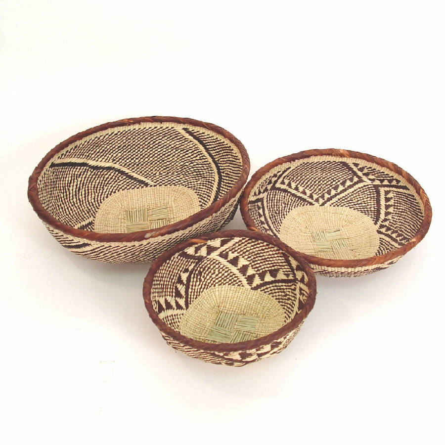 Handwoven Tonga basket bowl from Zimbabwe, natural fiber with a woven geometric pattern