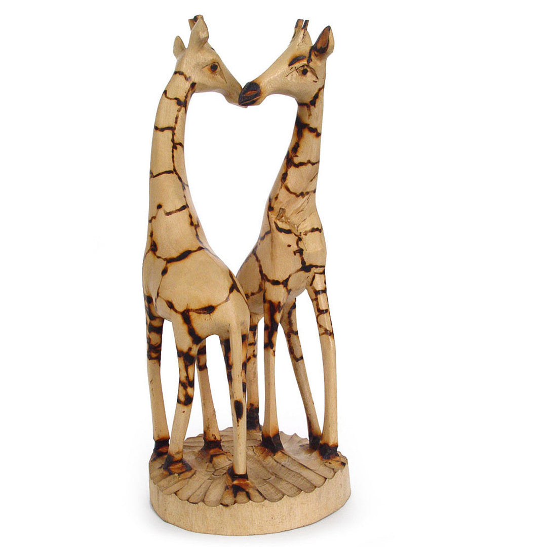 Hand-carved jacaranda wood giraffe pair with detailed grain and natural finish.