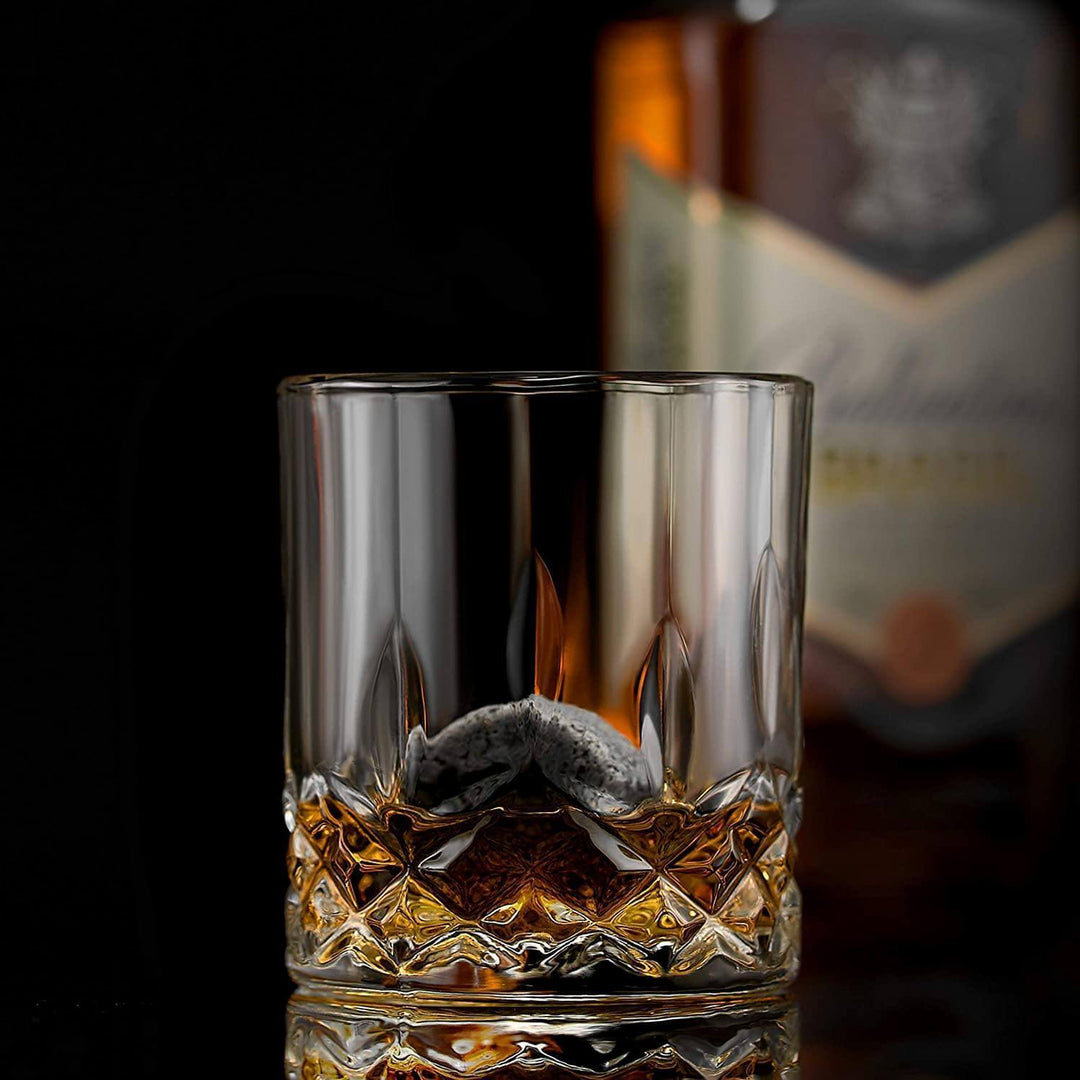 Set of crystal whiskey glasses with a clear, elegant design.