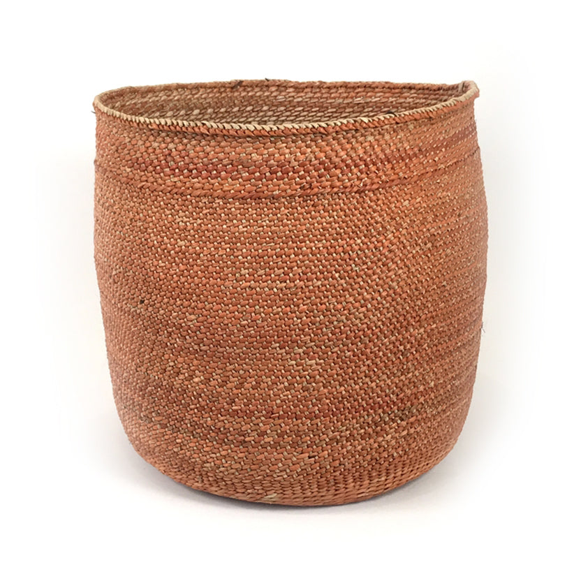 Handwoven auburn Iringa basket with a detailed woven design and roomy interior.