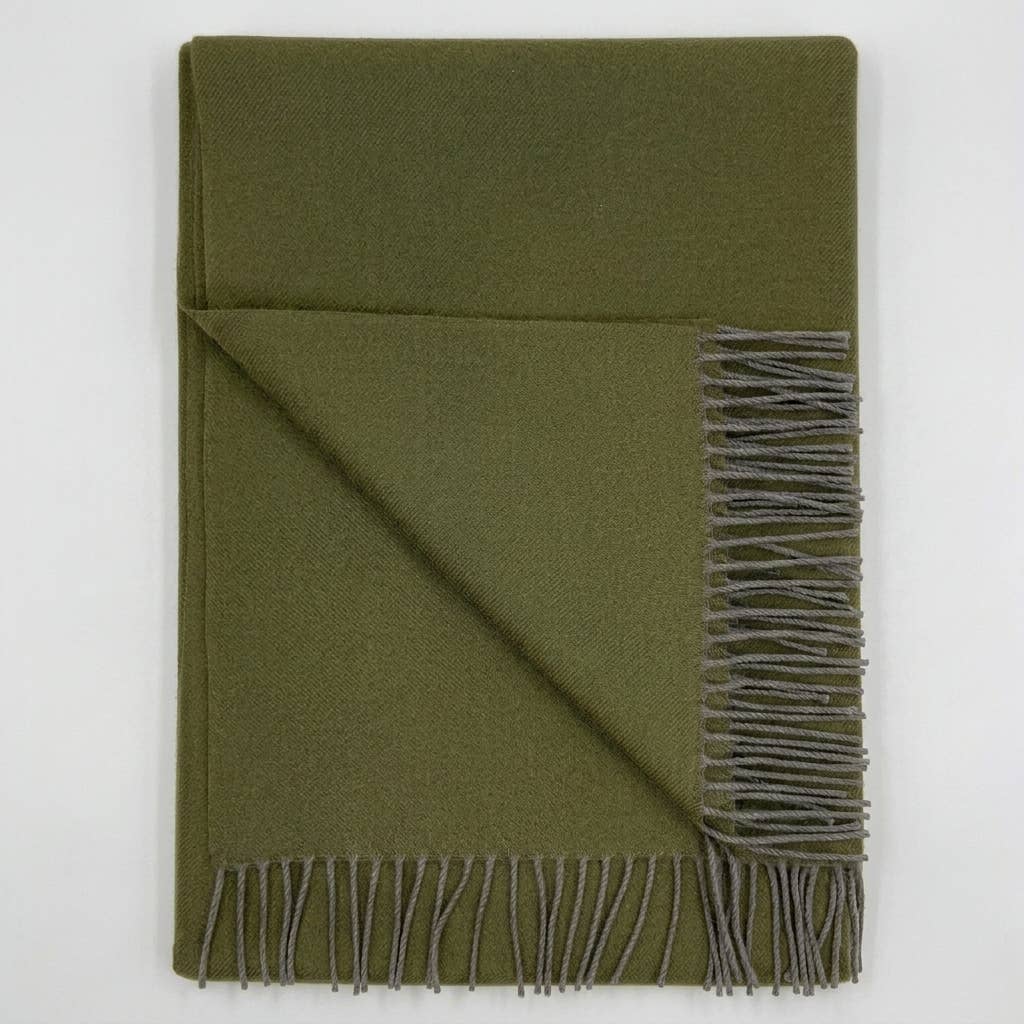 Handwoven baby alpaca throw blanket in olive, 51 by 71 inches with a brushed finish.