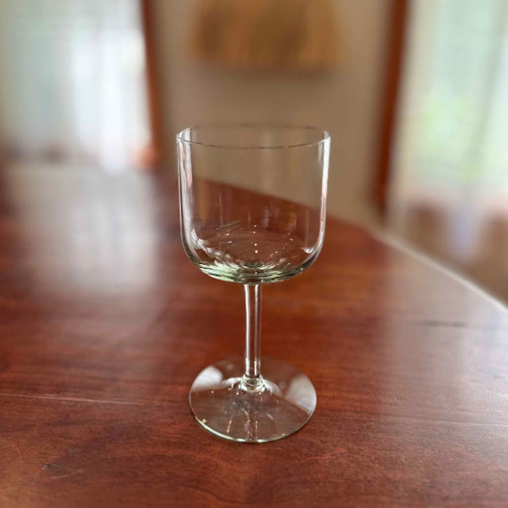 Recycled-glass retro wine glass, hand-blown with subtle handmade variation, clear vintage design.