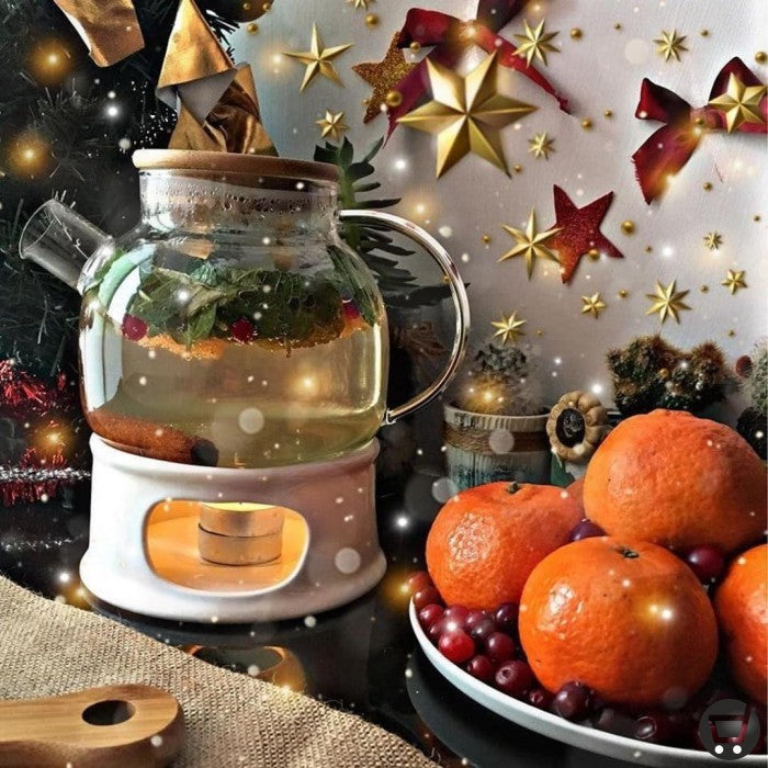 Borosilicate glass teapot with a lid and handle, for brewing tea.