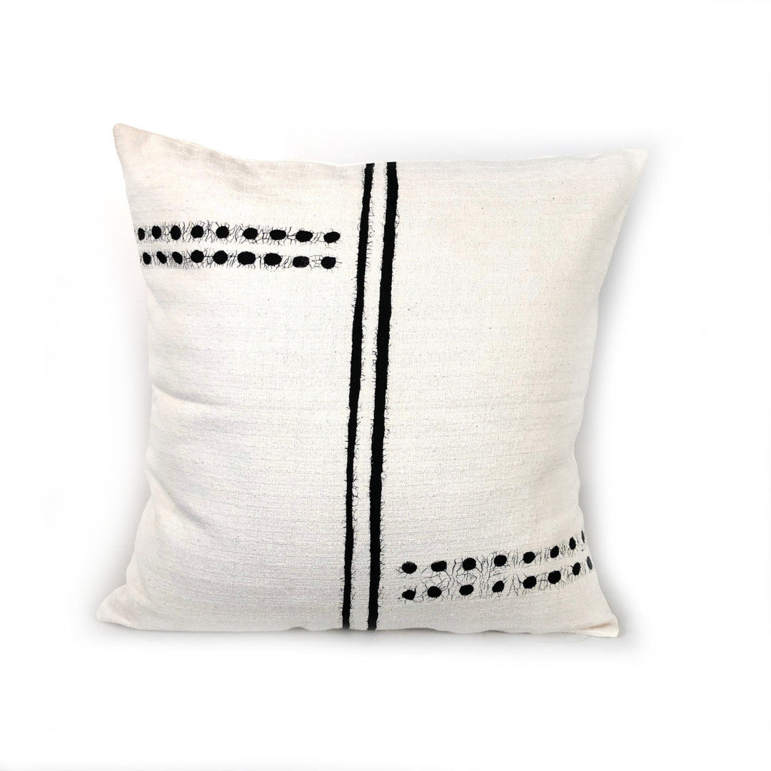 White cotton sadza pillow cover with a hand-painted dots-and-lines pattern, handwoven in Zimbabwe.